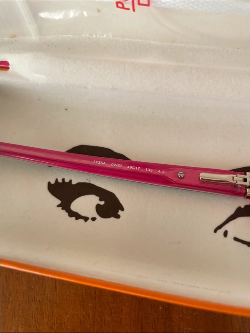 kate spade Black and Pink Rimless Cat Eye Glasses